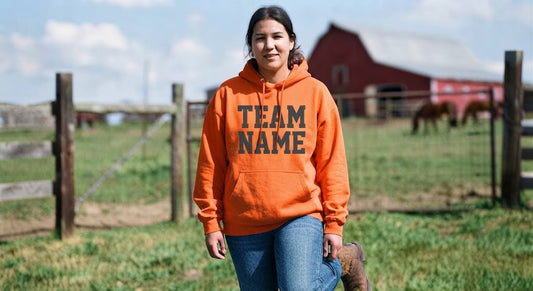 Country Farm Fashion: Woman in Orange Hoodie Outdoors