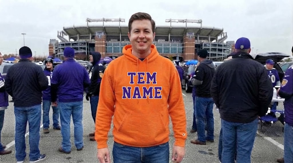 Fan in Baltimore Ravens Orange Hoodie Outside Stadium