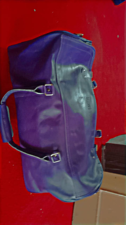 Here is a breakdown of the custom purple duffel/travel bag shown in the images: