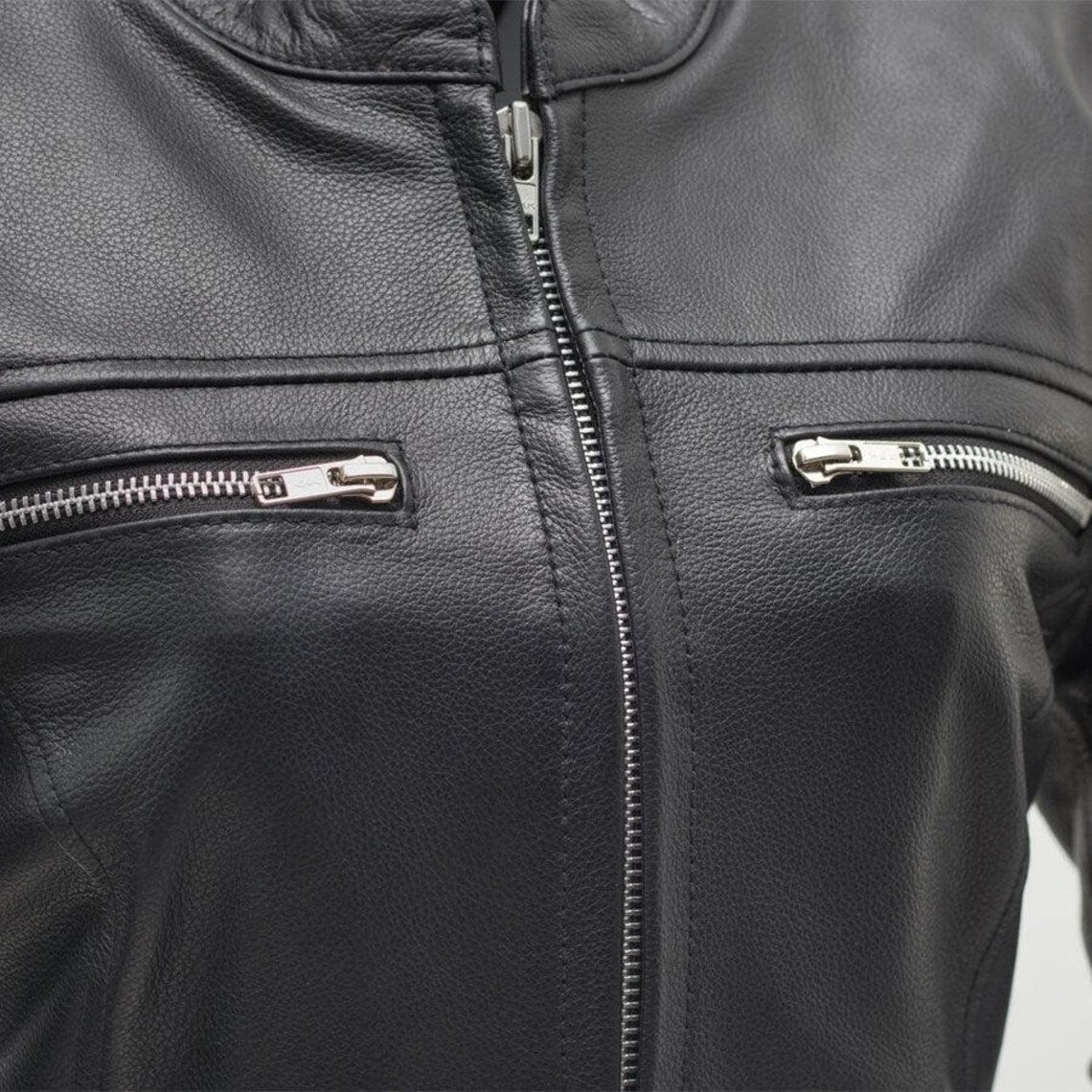 Women's Classic Black Leather Motorcycle Jacket with Vented Chest Pockets and Action Back